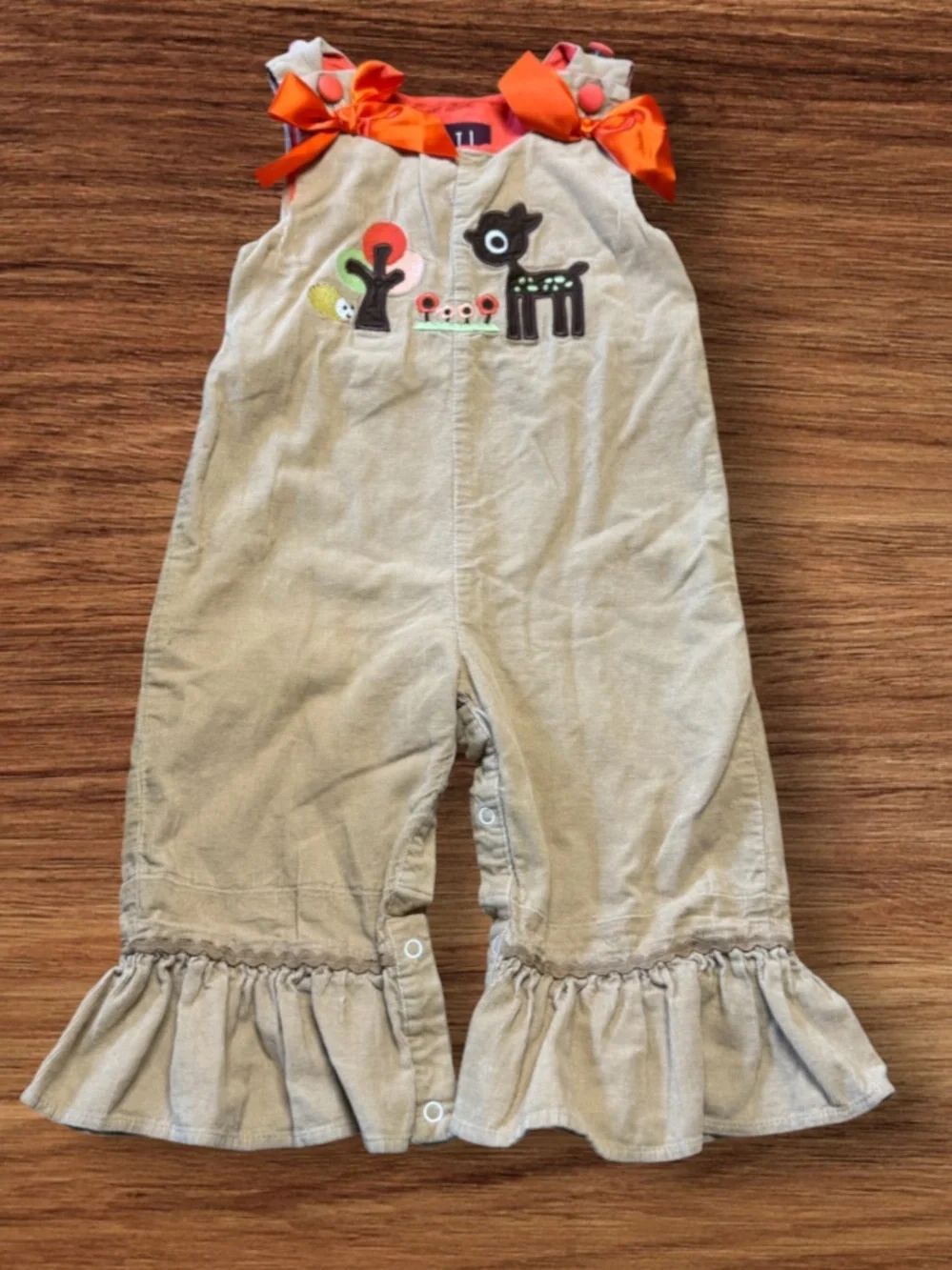 vintage-style corduroy longall romper from the children's brand Lil Cactus.